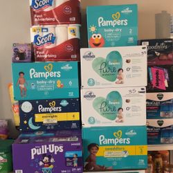 BRAND NEW HUGGIES AND PAMPERS