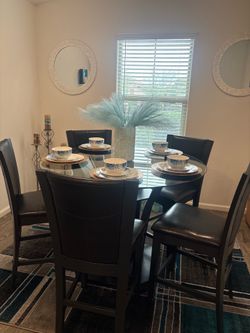 Table and five chairs
