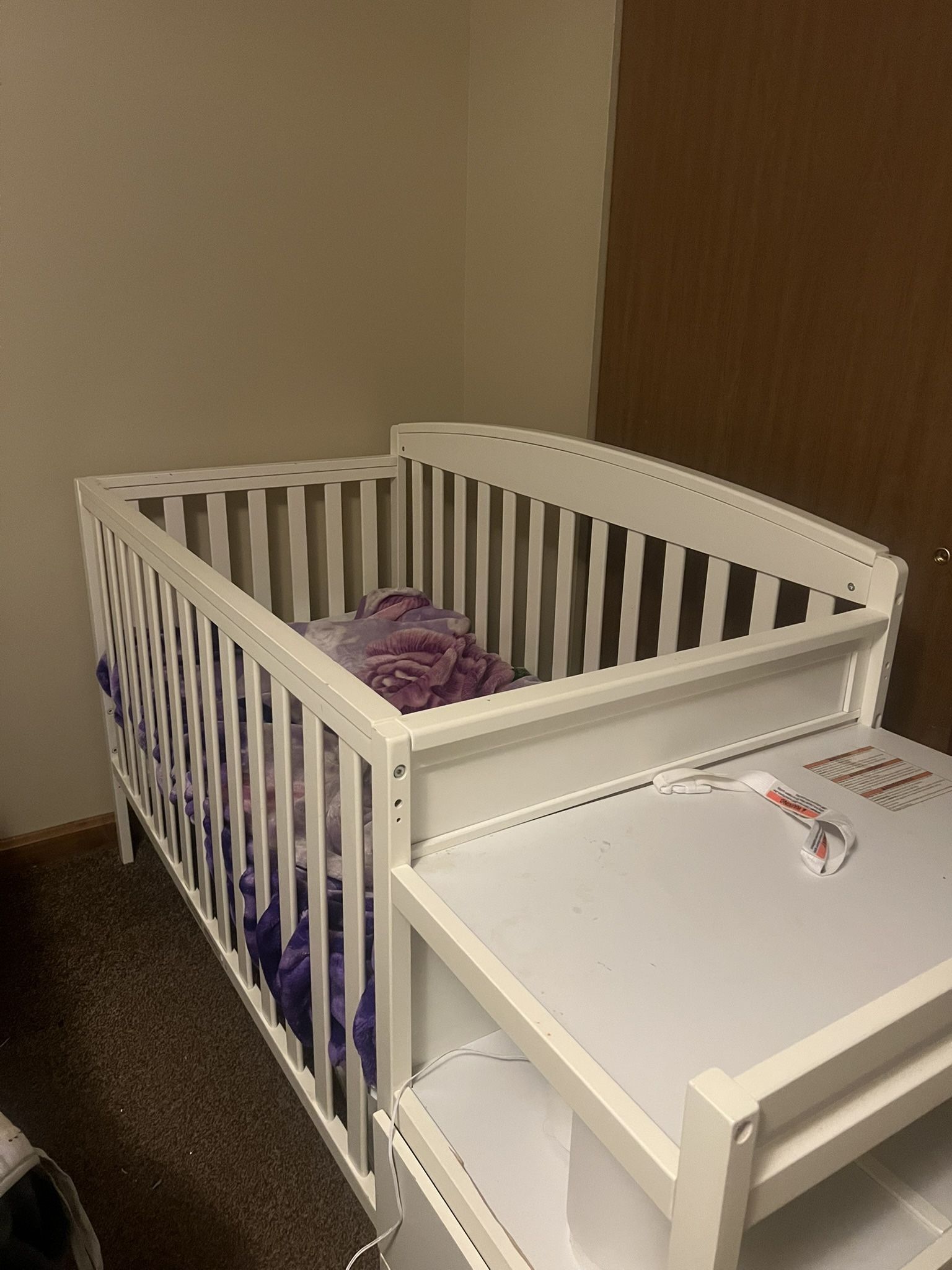 Organizing tables, microwave, and baby bed