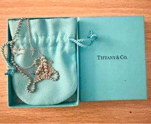 Tiffany & Co. - Sterling Silver Necklace w/ Elephant Pendant.