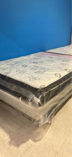 New full mattress and box spring 2 pc bed frame is not included