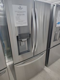 $1399 LG 28 Cu Ft 3 door french door refrigerator with ice and water dispenser