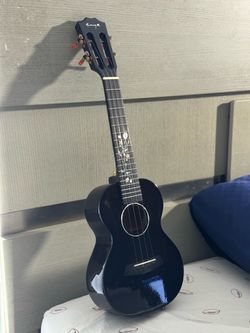 Enya Black Ukulele with Floral Fretboard Inlays