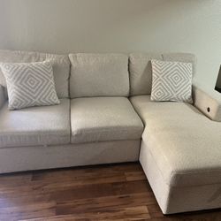 Beige Couch With Storage And Pullout And Charger