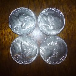 Four 1969 S Nickles