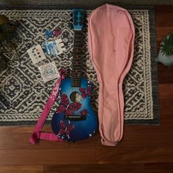 First Act Discovery Kid Learning Guitar