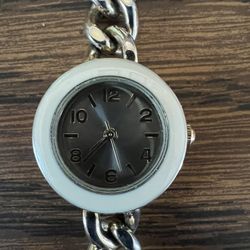Lady’s Silver tone watch, white around watch face; needs battery 