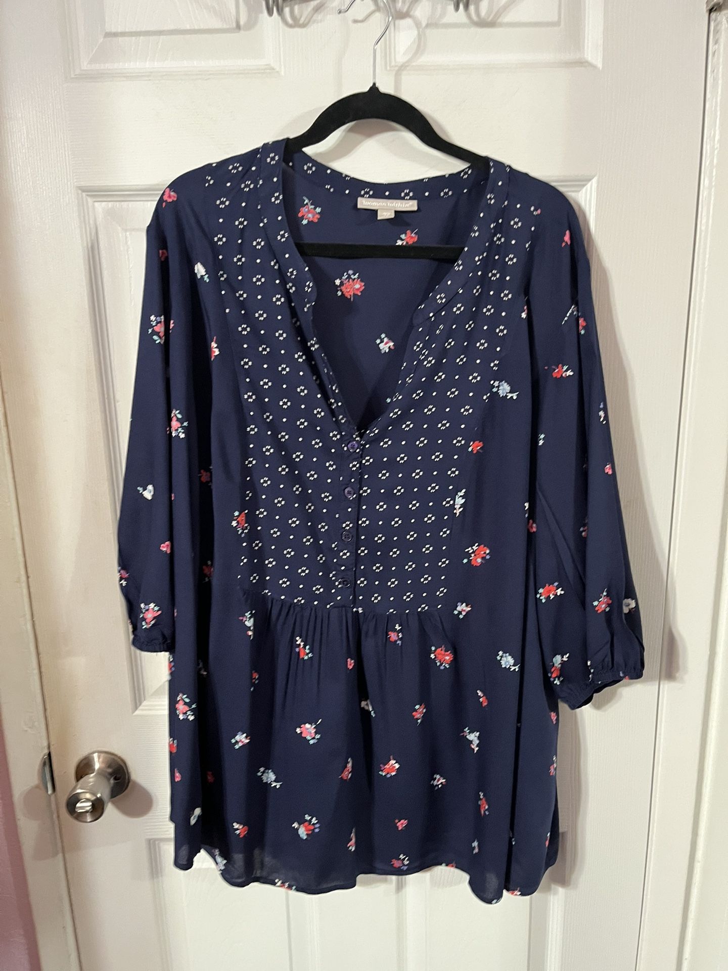 Women’s Size 2X (also Says 26/28) Navy Blue Blouse with little floral design. Has 3/4 length sleeves. Made of 100% Rayon. Brand Woman Within. Bran
