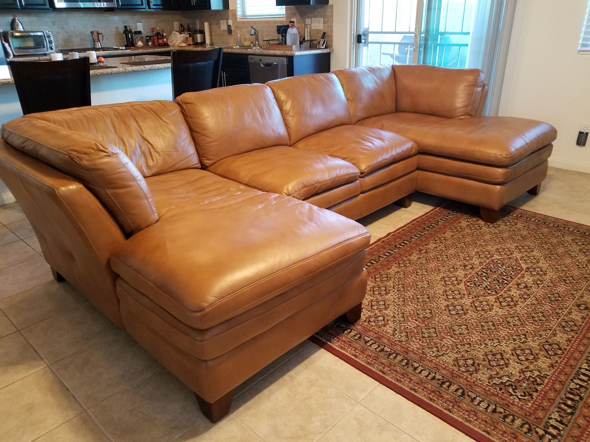 Great 100% leather couch, your house needs it