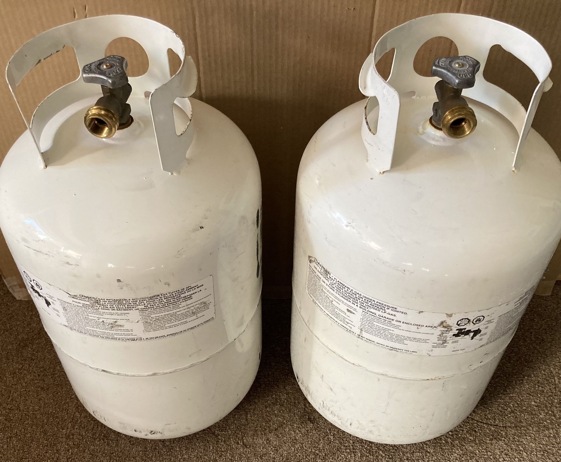 Propane Tanks 2 of themBoth 30 LBSUsed & Still Work GoodThey Both