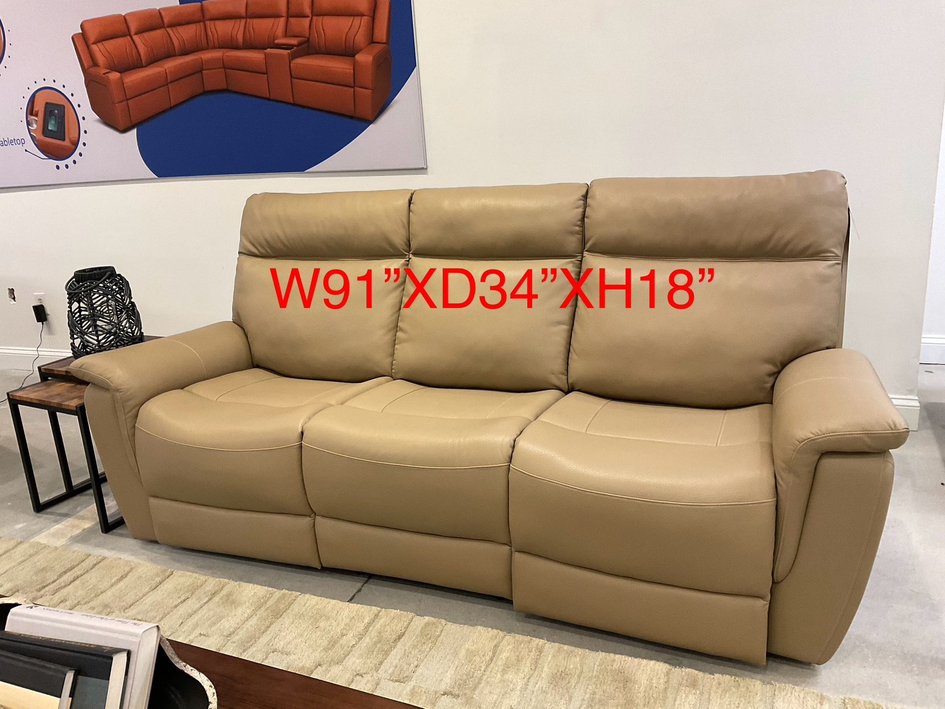 New 3 seater dual power recliner sofa with power headrest.