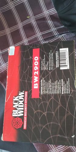 A,BLACK WIDOW CAR ALARM WITH 2 KEYLESS REMOTE CONTROL