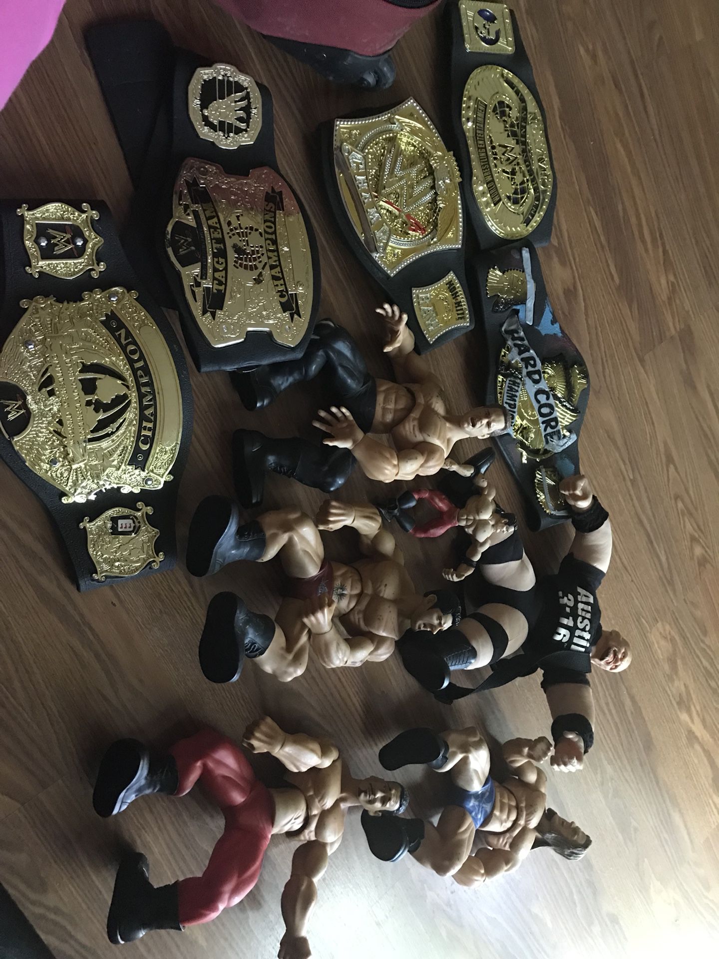 Oversized wrestling figures and toy belts