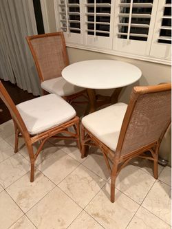 Table with rattan chairs