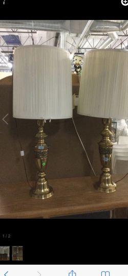 Pair of brass lamps