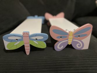 2 adorable white shelves with butterfly and firefly