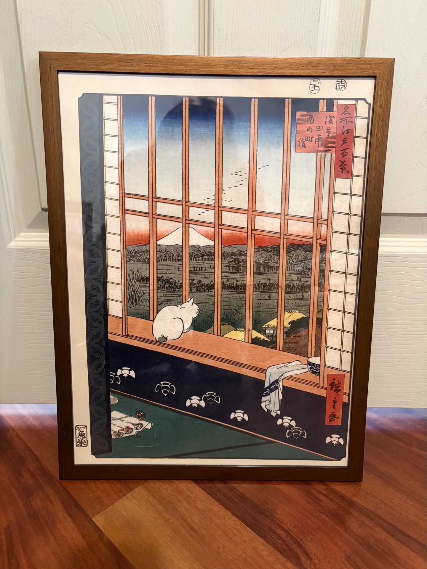 Framed Japanese cat window photo