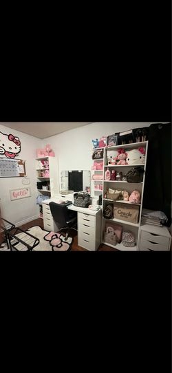 Vanity, desk, and bookshelves