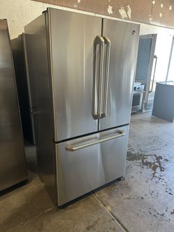 Fully Wrapped stainless steel GE Cafe™ Series 20.7 Cu.Ft. Counter-Depth Frenchdoor Water and icemaker inside can deliver  Retail price $3000