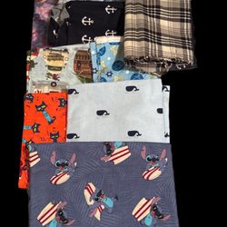 8 Pieces of Varying Sized Fabric Scraps