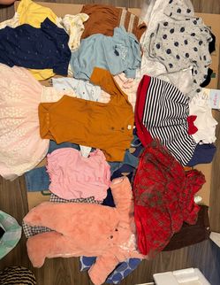 bunch of baby clothes