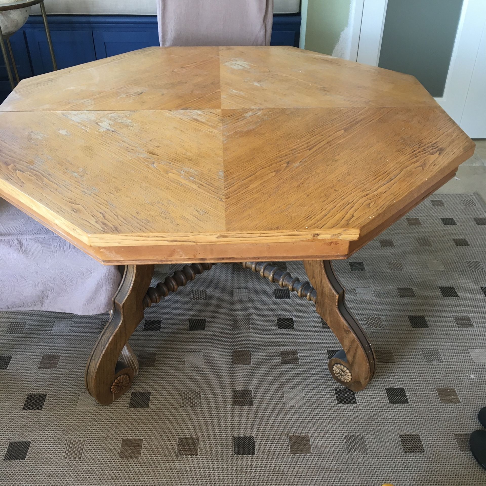 48 Inch Expandable Octagon Dining Table With Two 12 Inch Leafs (expands to be 72 Inch Oval). 4 Leg Carved Pecan Base. Price Includes 4 Dining Chair