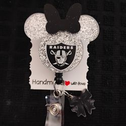 Minnie mouse shaped raiders badge reel