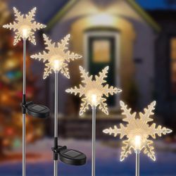 MAGGIFT 4 Pack Solar Christmas Snowflakes Garden Stake Lights, Solar Powered Outdoor Decorative Figurine Lights, Warm White LED Landscape Lighting, Wa