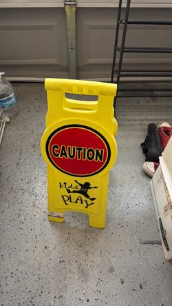 Kids at play street sign