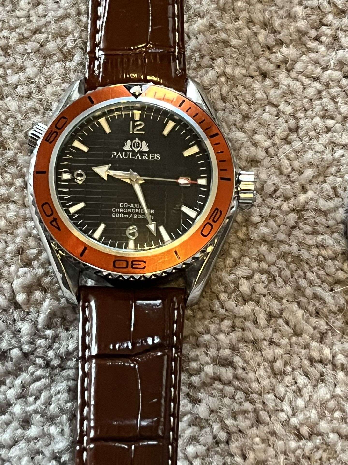 Inexpensive Mechanical Planet Ocean Homage Watch