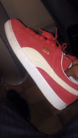 Red suede pumas