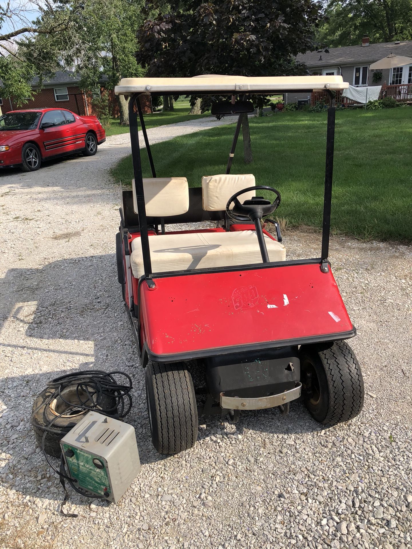 Golf cart ezgo needs batteries comes with charger spare tire