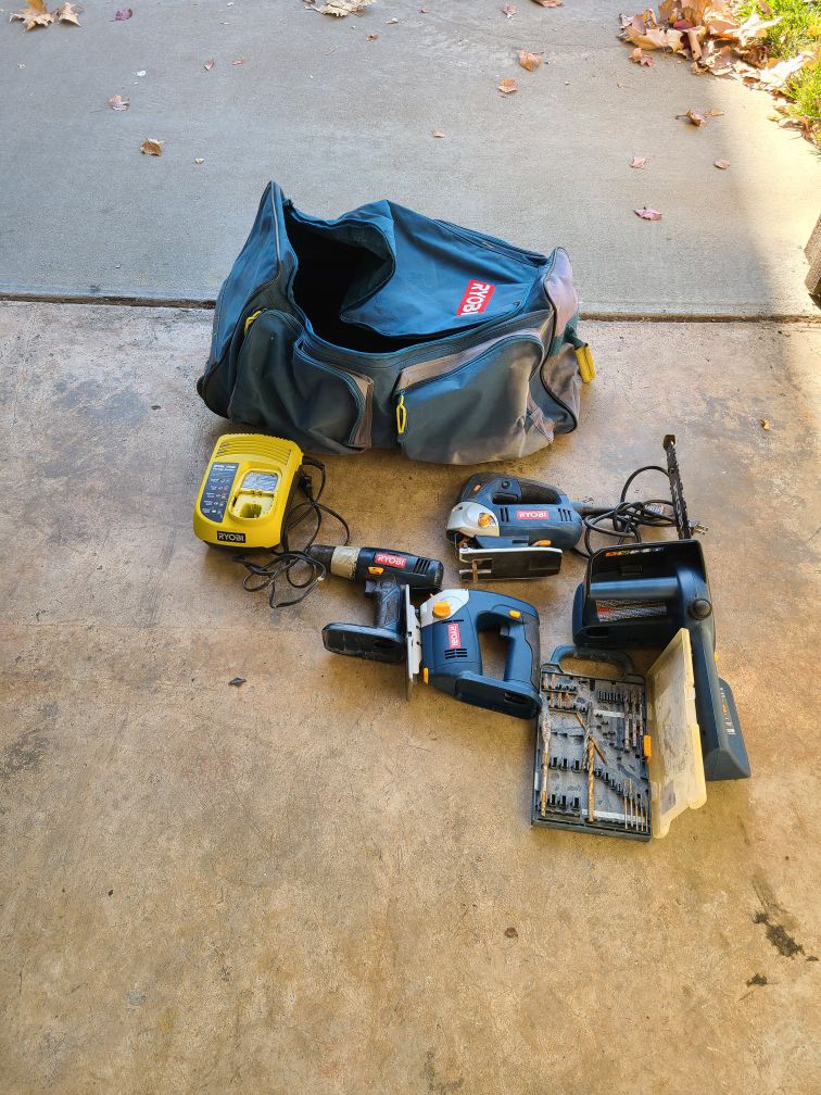 Ryobi 18v Drill, 10" Chainsaw, 2 Jigsaws, Charger, and Bag with Wheels