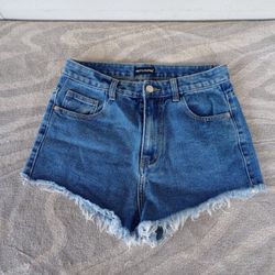 Pretty Little Thing Shorts Size US 4 medium wash