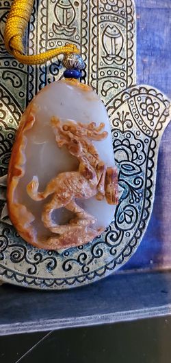 Hand carved white jade pendant carving