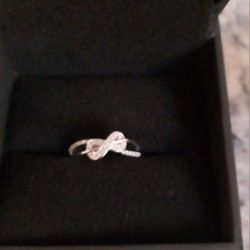 New Never Worn Have 2 Left Size 5 1/20 CT. T.W. Diamond Infinity Ring in Sterling Silver   Comes W/box From Zales Pick Up Only  Fall River Ma