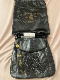 Christian Audigier crossbody bag with black satin dust bag
