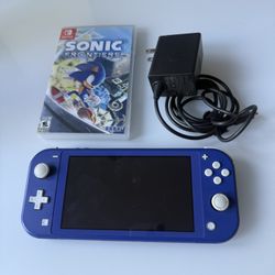 nintendo switch lite, with sonic game and charger. 
