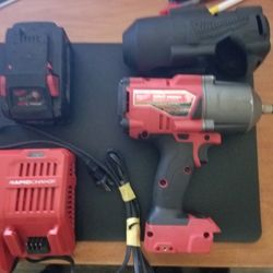 Milwaukee  M18 Fuel Impact Wrench Drill  1/2 With 8.0 Battery  Rapid charger  And Protective Boots 