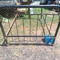 Antique iron bed frame, from the Victorian era,