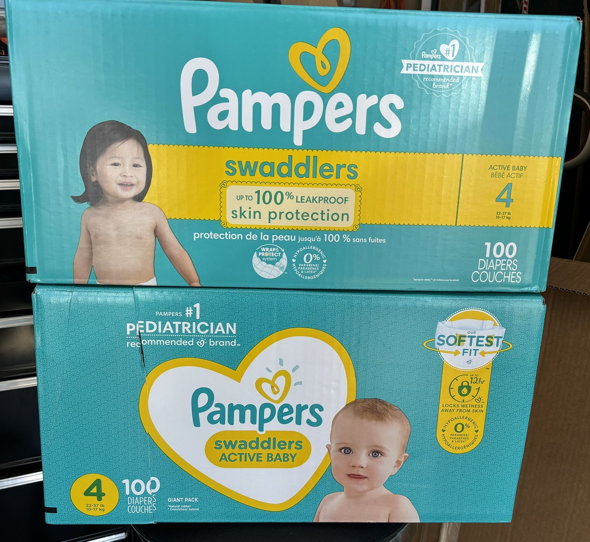 2 Boxes Of Pampers swaddlers Size 4 diapers