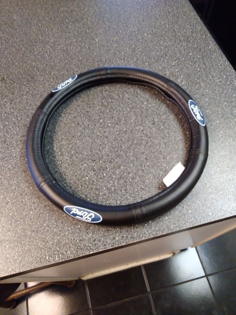 Deluxe Ford Steering Wheel Cover Never Used. Brand New
