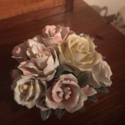 Basket of ceramic flowers seven dollars