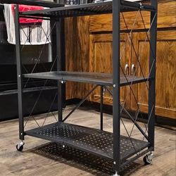 Brand new 3 layer 750lb heavy duty storage rack with wheels