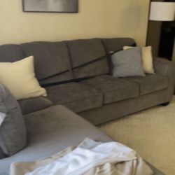 Ashley Furniture- Gray L-Shaped Sectional with Left Arm Facing Corner Chaise