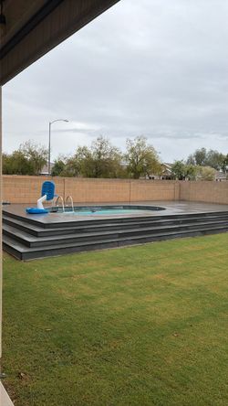 Above ground pool and deck