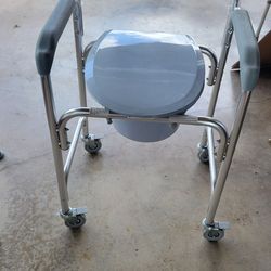 Bedside commode with wheels