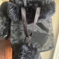 Black mesh bag with  faux fur small bag or wallet  Mesh bag measurements are 11”x9 Small fur measurement are  9”x5”  Both are in excellent condition l