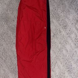 red nike track pants 