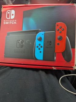 Nintendo switch console with Mario game